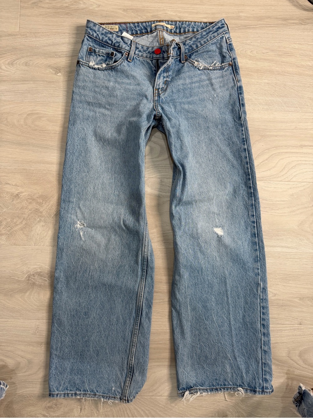 Levi's  Blue Women's Jeans Loose Fit
Custom Red Button and Patch

Amazing!
